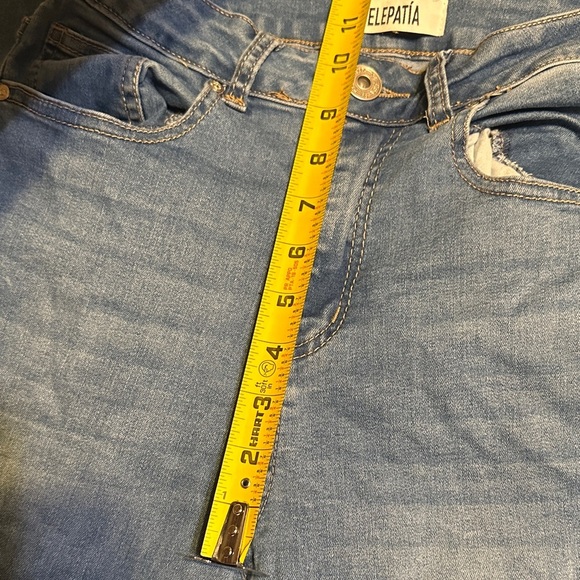 105.  Floral Embroidered Denim Flare Jeans - Picture 9 of 12